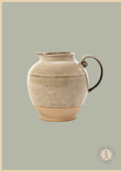 Brown Stoneware Pitcher by McGee & Co. featuring a reactive glaze, organic shape, and artisanal craftsmanship for a quiet luxury home.