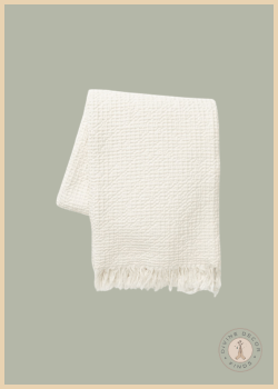 Viola Throw by McGee & Co. featuring a textured woven pattern, soft cotton construction, and decorative fringe edges.