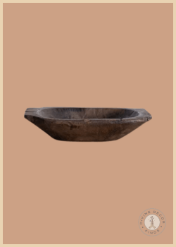 Vintage-inspired wooden bowl crafted from natural wood with a weathered finish and visible grain, styled against a warm neutral background.