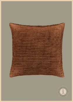 Article Camil square brown velvet pillow with a repeating raised geometric texture across the fabric.
