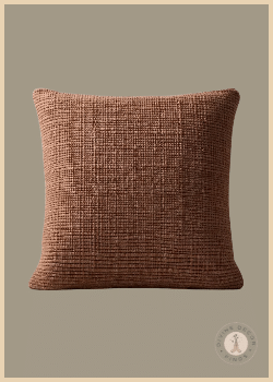 CB2 Monira square pillow cover in camel with a chunky handwoven wool and cotton grid texture.