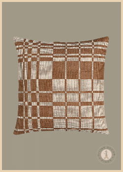 Crate & Barrel square wool and linen pillow in maple brown with an asymmetrical ivory plaid pattern.