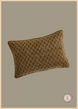 Magnolia Henry rectangular velvet pillow in warm taupe with a repeating dark botanical floral print.