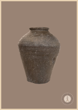 Distressed brown Rice Wine Jar from Shoppe at The Avenue with a weathered vintage finish and rounded ceramic form.
